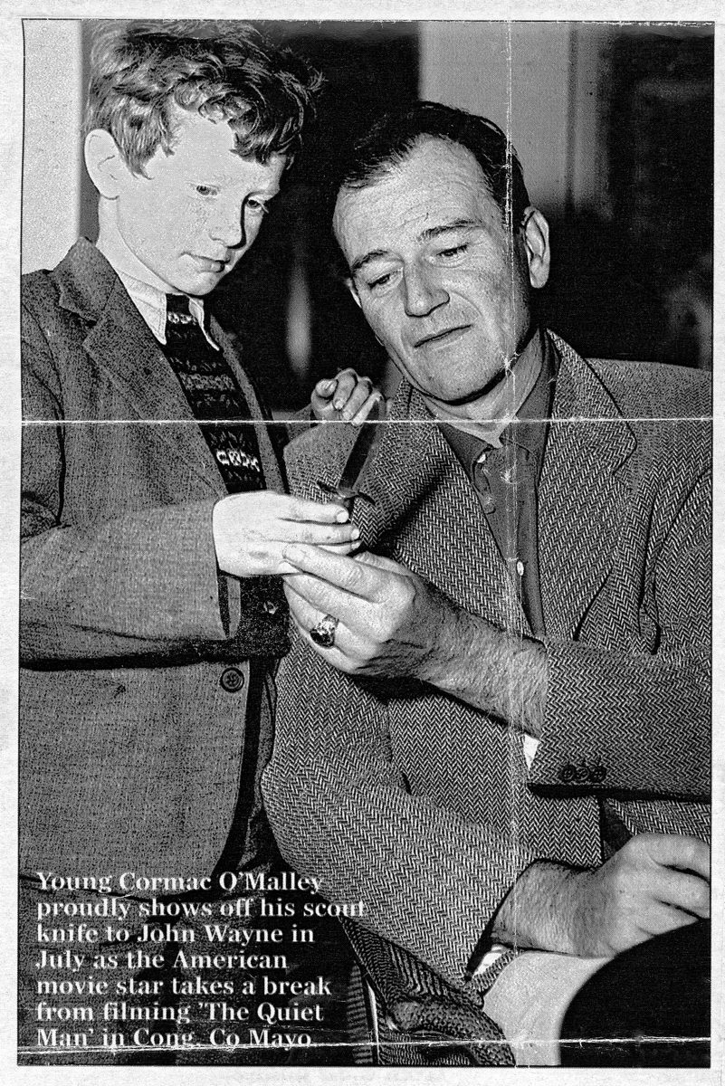 O'Malley // Connecticut & Mayo :: Cormac O’Malley (age 8) shows his scout knife to actor John Wayne, 1951